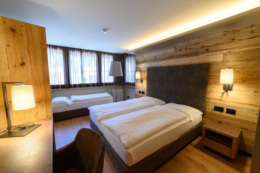 Bedroom at Hotel Crozzon in Madonna di Campiglio